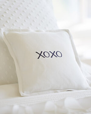 xoxo indigo on white linen pillow