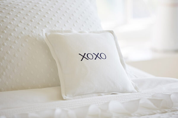 xoxo indigo on white linen pillow