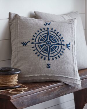 Compass on natural pillow