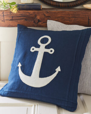 white anchor on indigo pillow