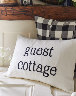 guest cottage black pillow