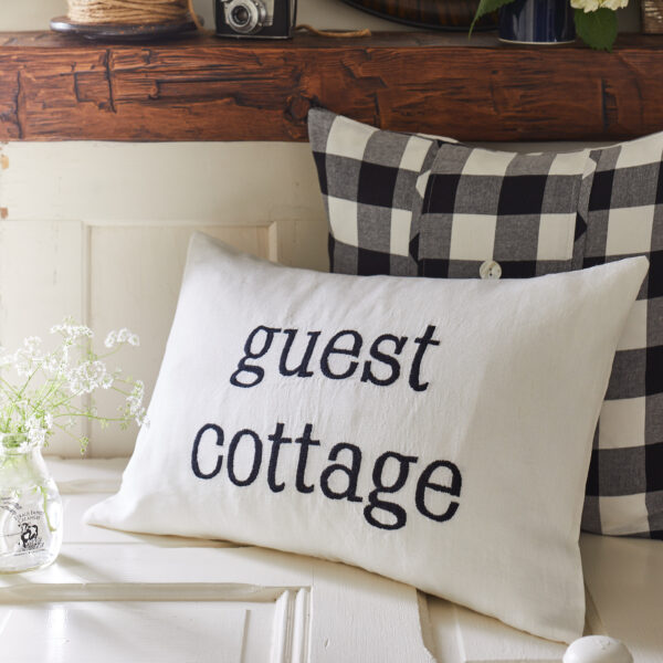 guest cottage black pillow